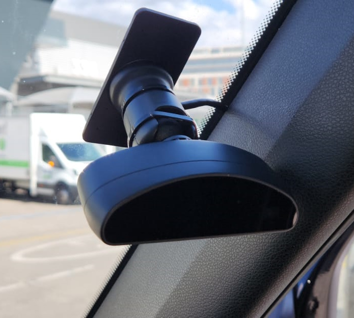 Advanced fleet camera system with AI monitoring dashboard showing real-time video feeds and analytics