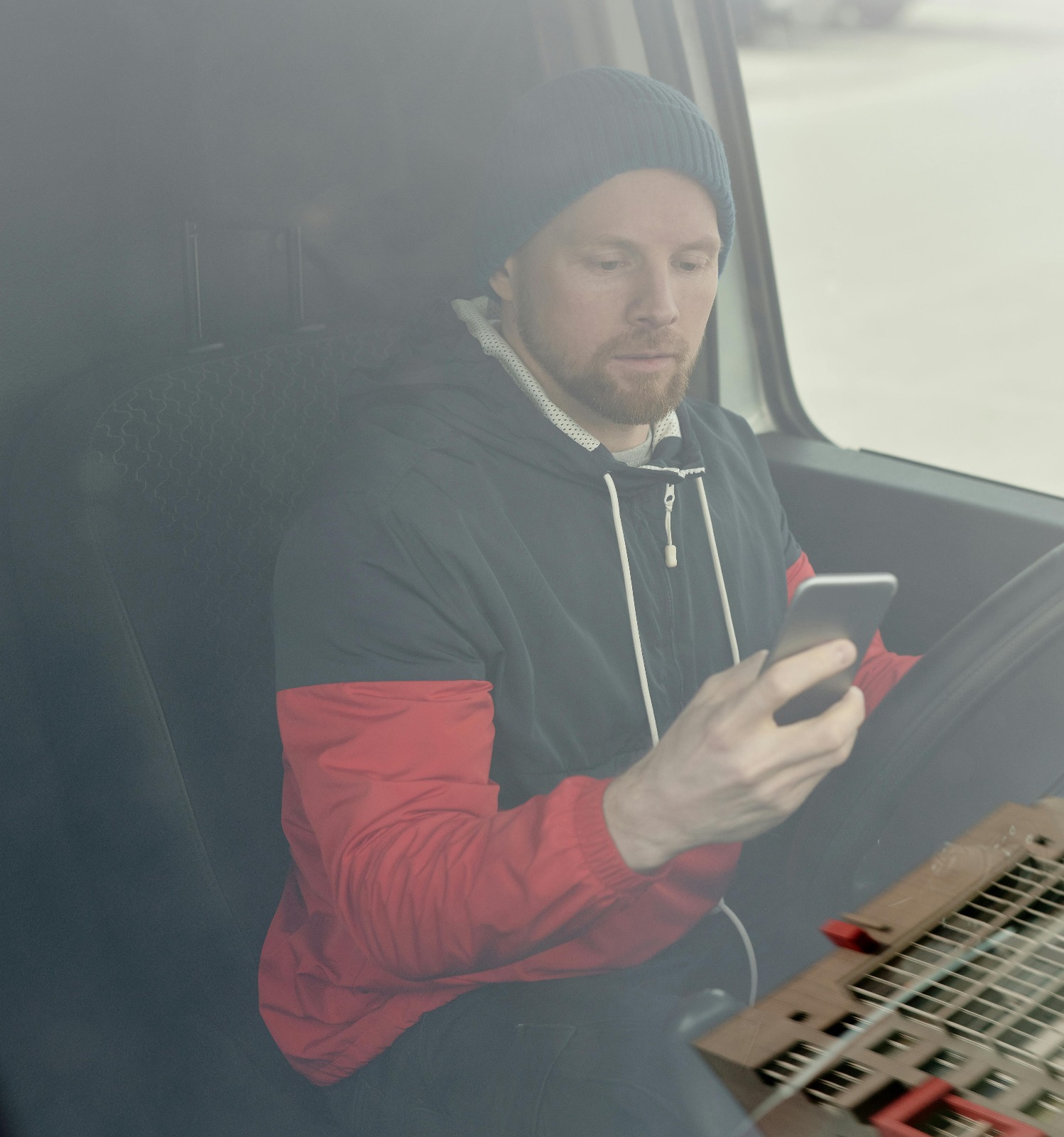 Fleet manager reviewing driver safety scores and performance metrics
