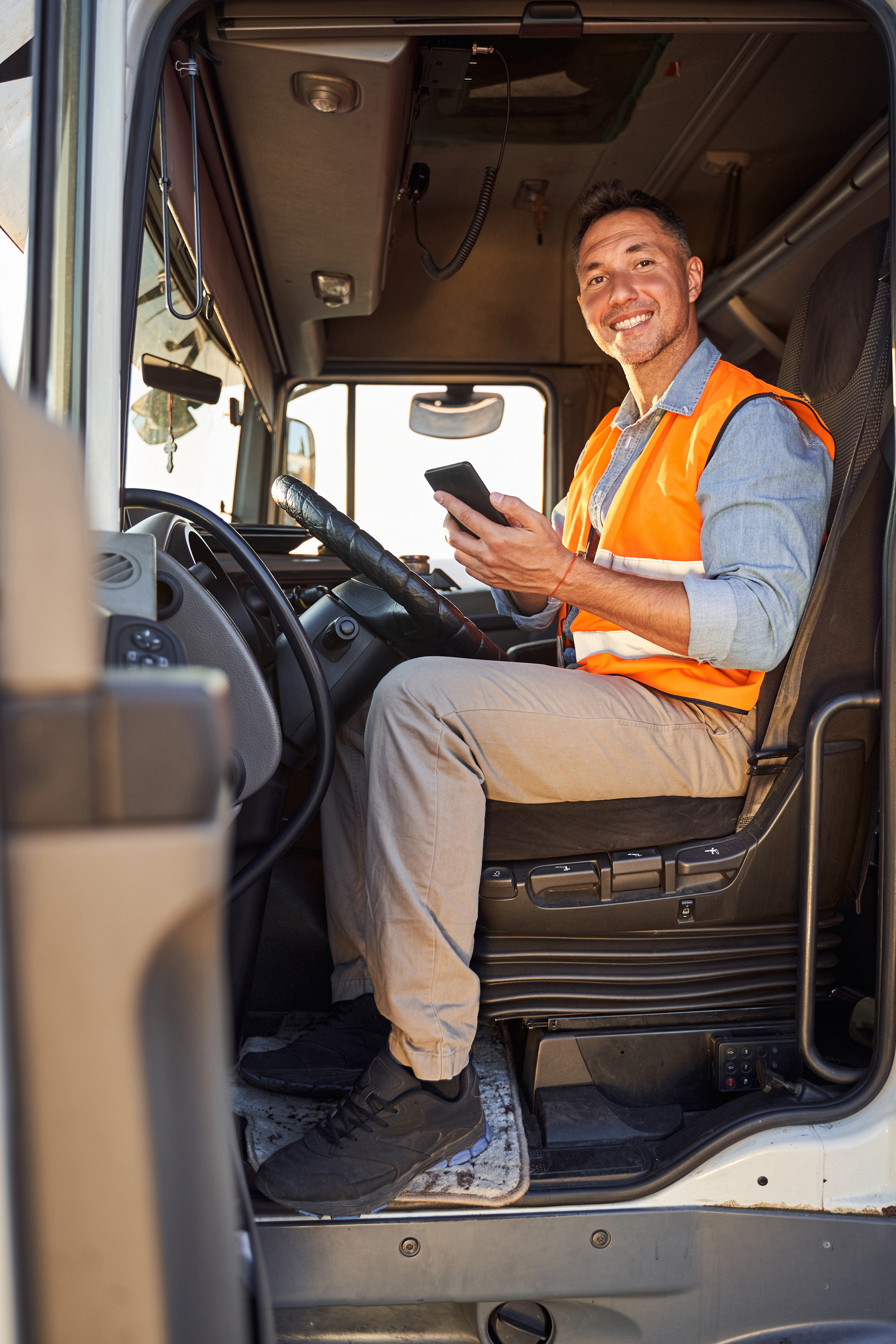 Comprehensive small trades solutions dashboard showing mobile app interface, route optimization and emergency dispatch features